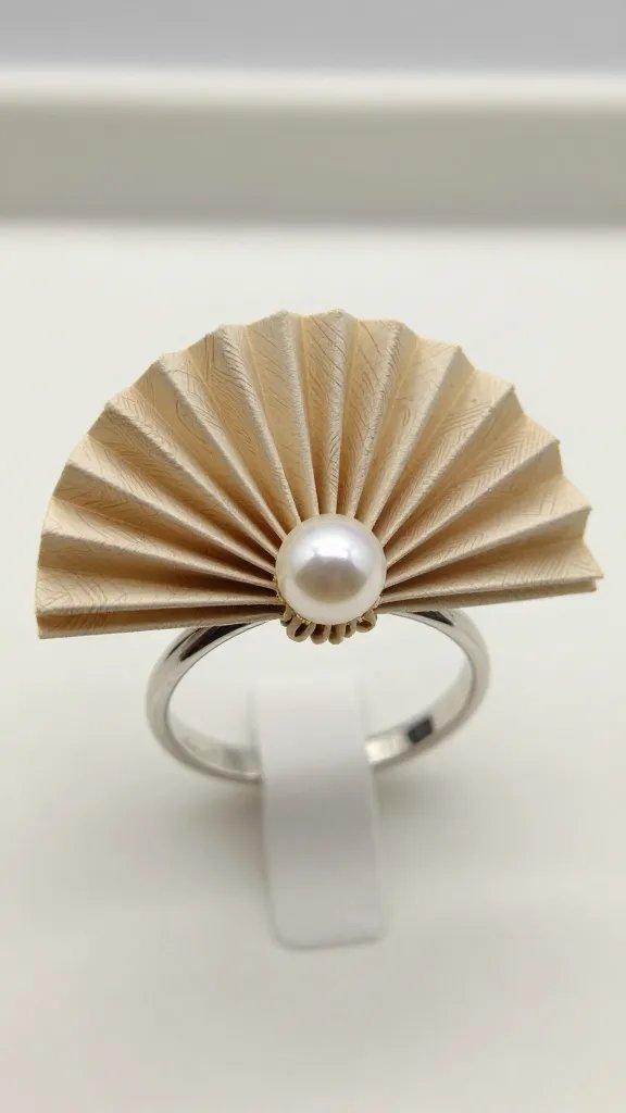 Accordion-Folded Fan Ring With Pearl Center