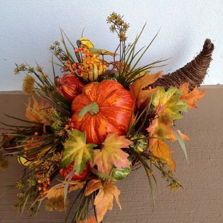 16 DIY Cornucopia Ideas That Turn a Basic Basket Into the Star of Your Fall Table 8 arcadia floral 1506125797